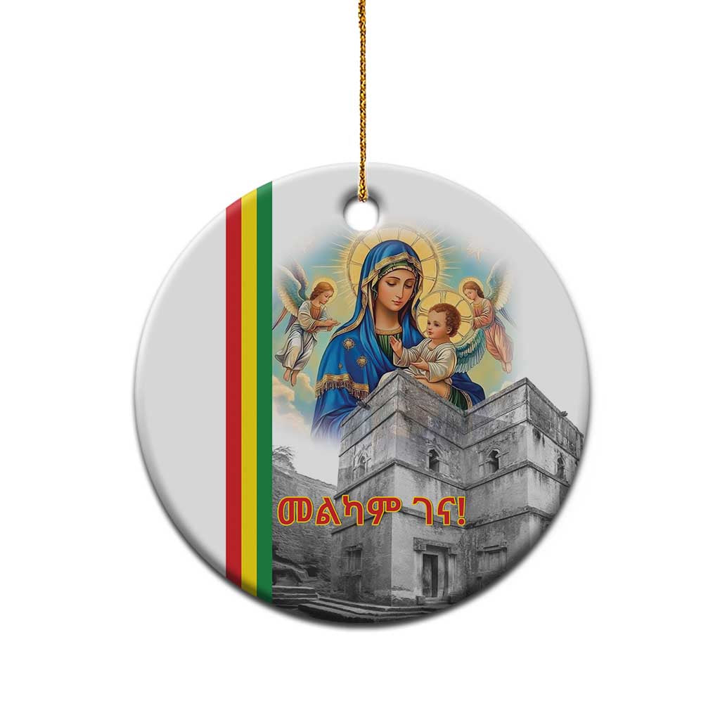 Round white ceramic ornament with Saint Mary and church design, gold hanging string