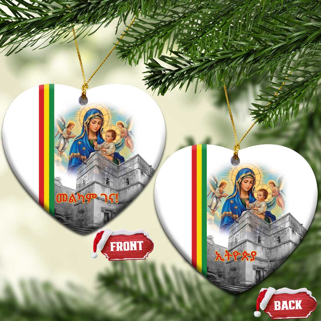 Pair of white ceramic heart-shaped ornaments with Saint Mary and church artwork, gold loops