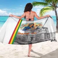 White sarong with Madonna and child over gray church print, worn from behind