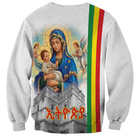 Unisex light-gray sweatshirt with Mary holding baby, church graphic, flag stripe on back