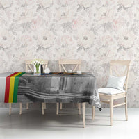 Christmas tablecloth on dining table with Saint Mary church illustration and multicolor stripe border