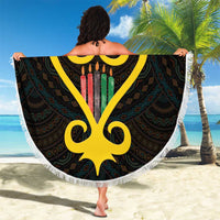 Held-up round black beach blanket with white fringe, yellow heart and Adinkra, 'Your Text'