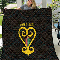 Black quilt with diamond quilting and yellow Adinkra heart graphic reading 'YOUR TEXT'.