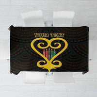 Black tablecloth with gold heart graphic and Adinkra-style pattern, personalized text