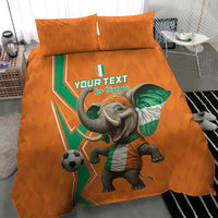 Orange football bedding set with large elephant soccer graphic and matching pillows