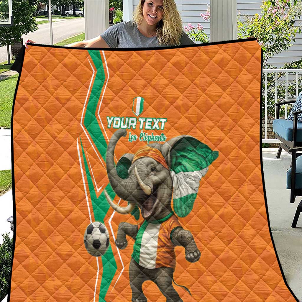 Orange football quilt with green-white elephant mascot and soccer ball graphic