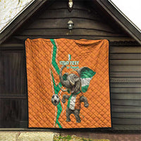 Orange football quilt displayed on wooden wall with elephant mascot soccer print