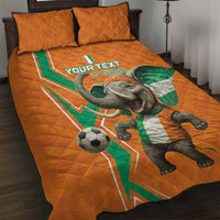Orange football quilt bed set with elephant graphic and 'YOUR TEXT' on the comforter.