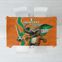 Orange football-themed tablecloth with elephant and soccer ball graphic