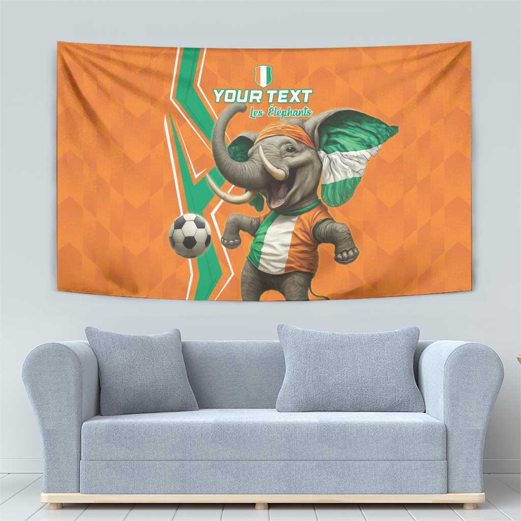 Orange football tapestry showing baby elephant in green-and-white jersey with soccer ball.