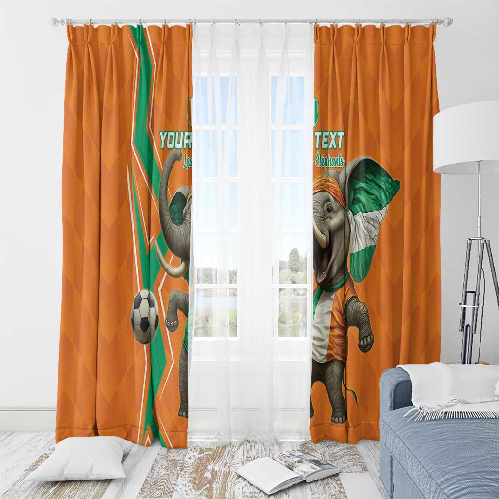 Orange elephant soccer window curtains with hanging hardware above a bed set