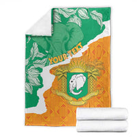 Custom throw blanket folded, Ivory Coast map in green and orange with elephant crest