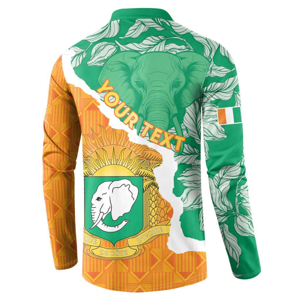 Back of green and orange button-up sweatshirt with elephant crest graphic