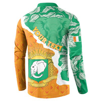 Back of green and orange button-up sweatshirt with elephant crest graphic
