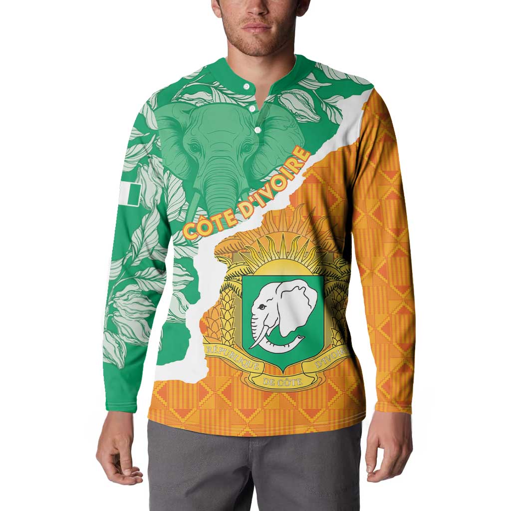 Green and orange button-up sweatshirt with elephant crest and map graphic