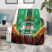 Green throw blanket with central crest, red roses, and “YOUR TEXT” text