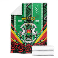 Green personalised blanket with coat of arms crest, “YOUR TEXT”, and red roses hem