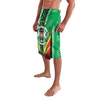Green patterned knee-length shorts with side crest emblem and rose motif
