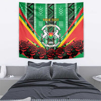 Green hanging tapestry showing coat of arms crest, red roses, and "YOUR TEXT" text