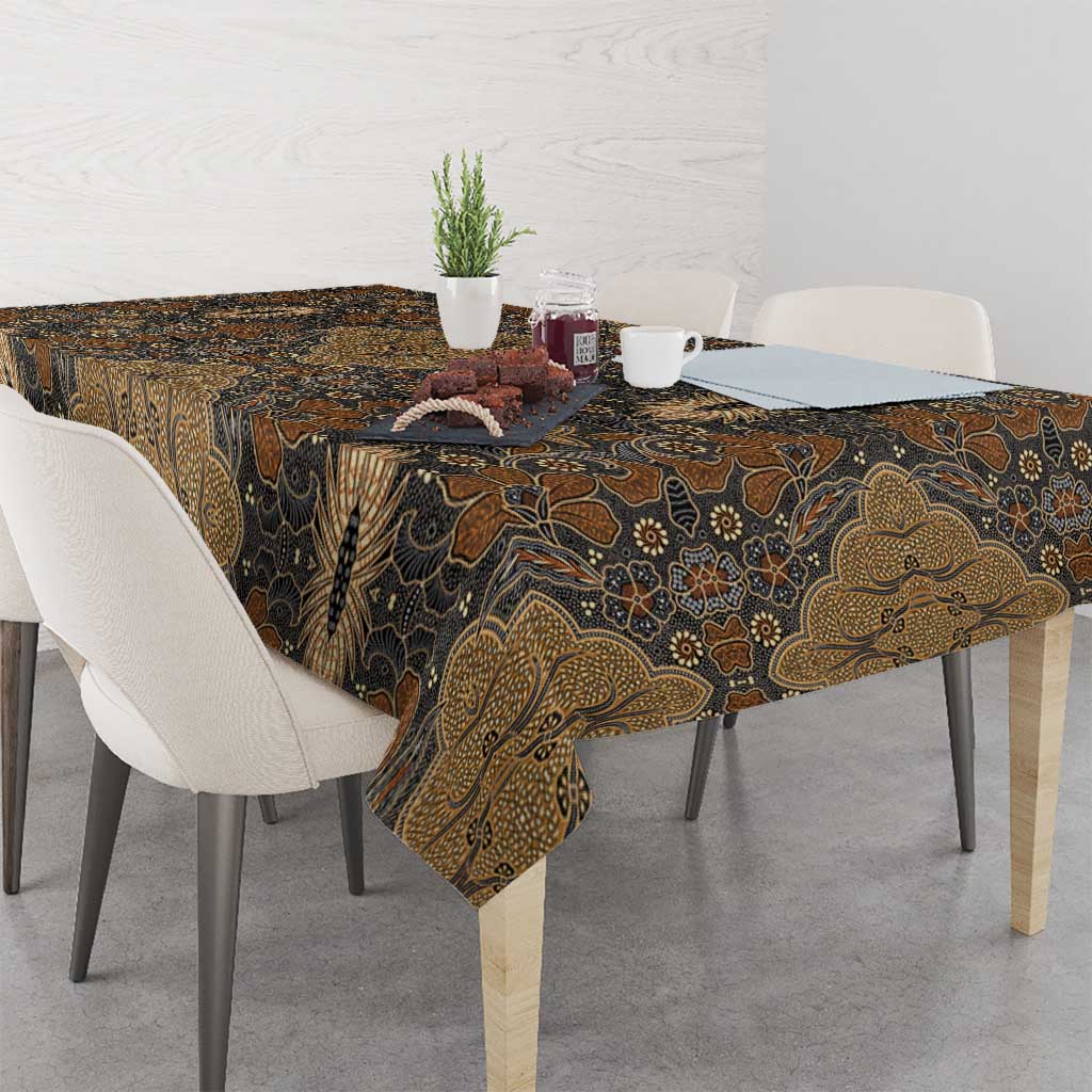 Brown batik tablecloth with ornate gold pattern and dark floral accents