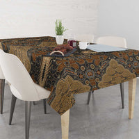 Brown batik tablecloth with ornate gold pattern and dark floral accents