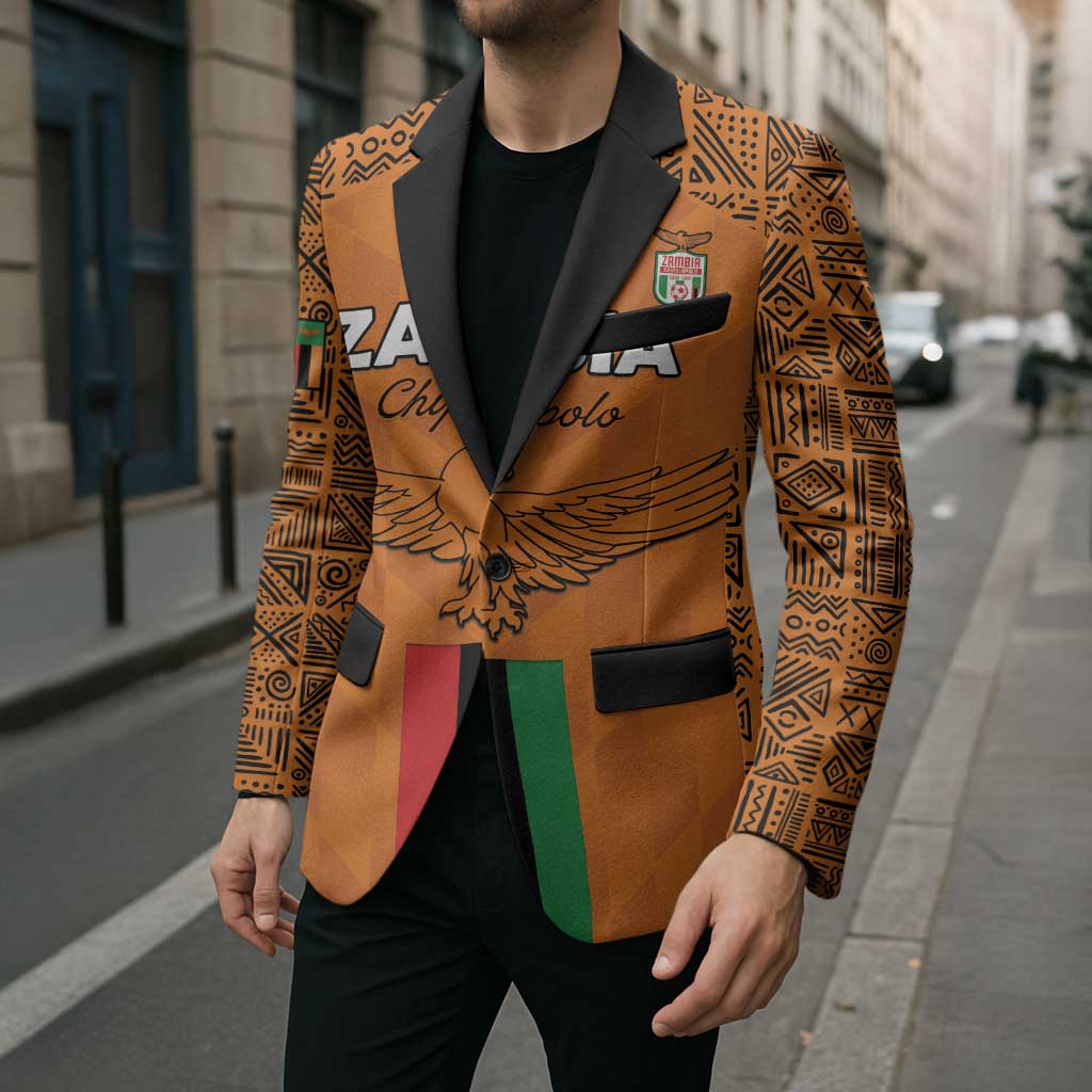 Orange football blazer with black lapels and crest patch, striped sash detail, flap pockets
