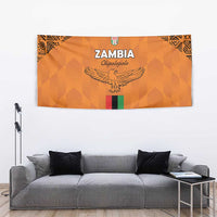 Orange Zambia football tapestry with eagle graphic, crest, and green-red vertical flag stripe.