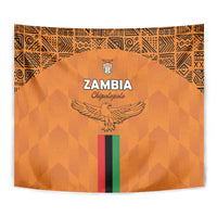 Orange Zambia football tapestry close-up with crest, eagle emblem, and multicolor vertical stripe.