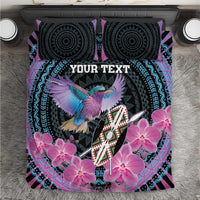 Purple and black bed cover set with pink orchids, colorful bird and tribal shield design