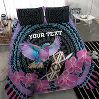Purple and black bedding set with large bird, pink orchids and tribal geometric shield center