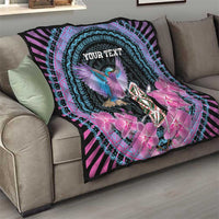 Personalized quilt on sofa; black with purple stripes, turquoise rings, bird, pink orchids, “YOUR TEXT”