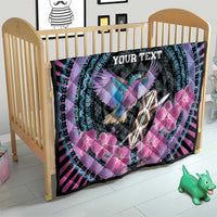 Personalized quilt on crib; turquoise circular border, bird, pink orchids, and “YOUR TEXT”
