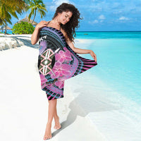 Personalized sarong with black base, magenta orchid flowers, teal geometric circle, and bird