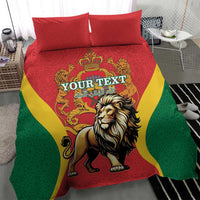 Bedding set with red duvet and two red pillows showing lion and crown crest with green and yellow waves