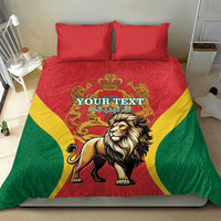 Red duvet and two red pillowcases with lion and crown graphic, green and yellow curved accents