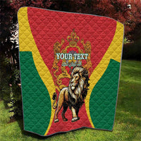 Moroccan proclamation quilt with crowned lion in red medallion; green and yellow geometric border