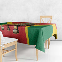 Red tablecloth with lion symbol, green drape and yellow frame