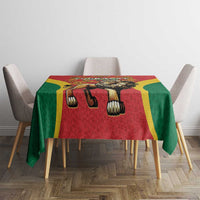 Personalized red tablecloth with lion motif, green sides and yellow border