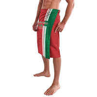 Red lavalava skirt with green panel and vertical stripe design, side view
