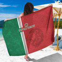 Custom football sarong with red and green panels, lion print and striped borders