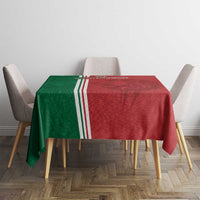 Square football tablecloth with red and green panels and white stripe trim, fully draped