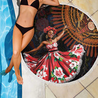 Circular beach blanket with black tribal and floral design, white tassel fringe edge