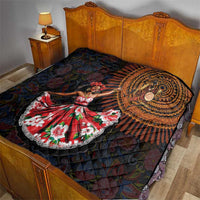 Traditional dance quilt on bedspread, circular paisley design with red-and-white dancer