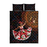 Black quilt bed set with dancer portrait panel, orange paisley medallion, and 2 matching pillowcases