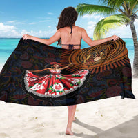 Sega traditional dance sarong, black with gold medallion design and red-green floral hem