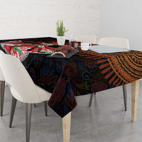 Dark African paisley tablecloth draped over a dining table, showing colorful motifs