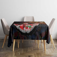 Dark paisley African style tablecloth on a dining table with multi-color central design