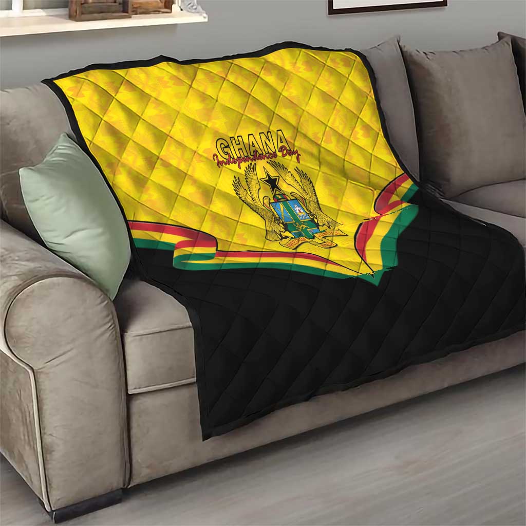 Ghana quilt blanket draped on couch, yellow top with crest and multicolor stripe border