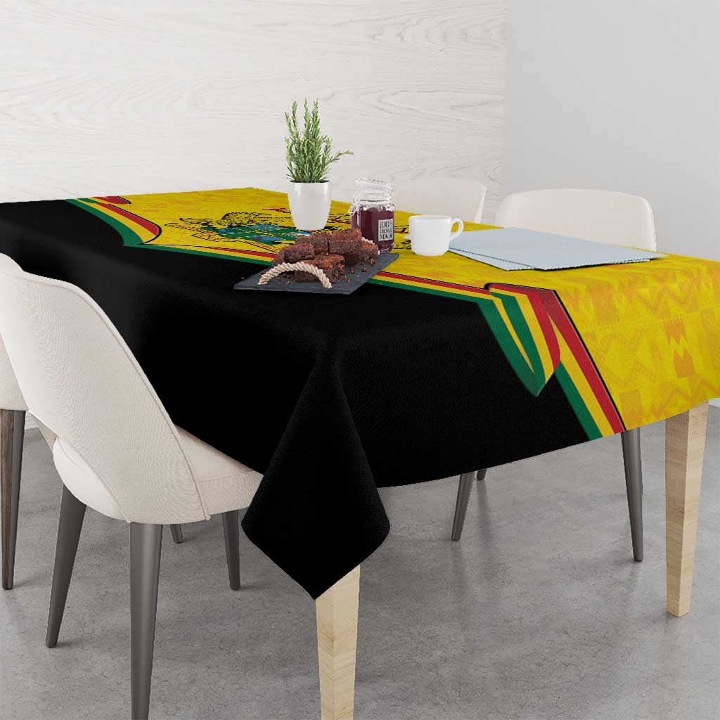 Ghana independence tablecloth draped on dining table with yellow and black Kente accents