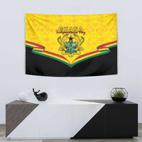 Yellow and black tapestry wall hanging with Ghana crest and Kente-style ribbon accents.